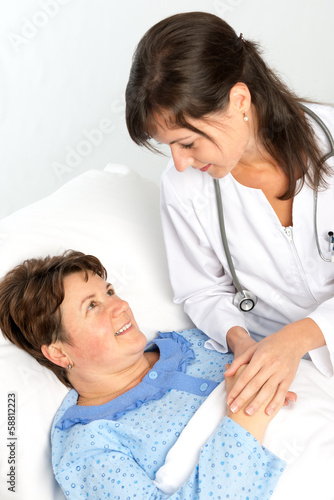 Nurse cares for a elderly woman