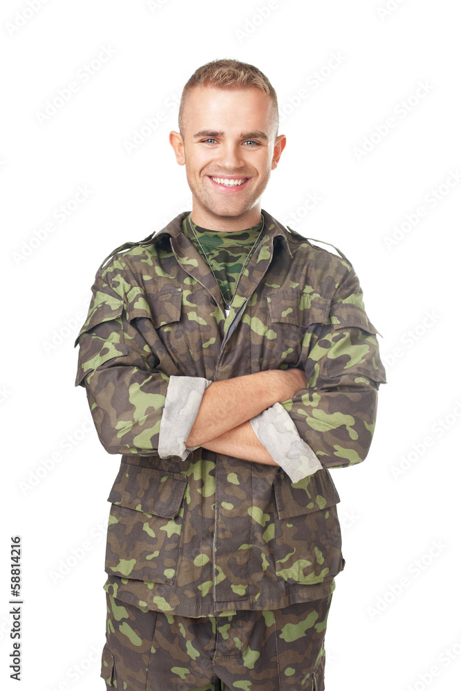 Smiling army soldier with his arms crossed Smiling army soldier with his arms crossed