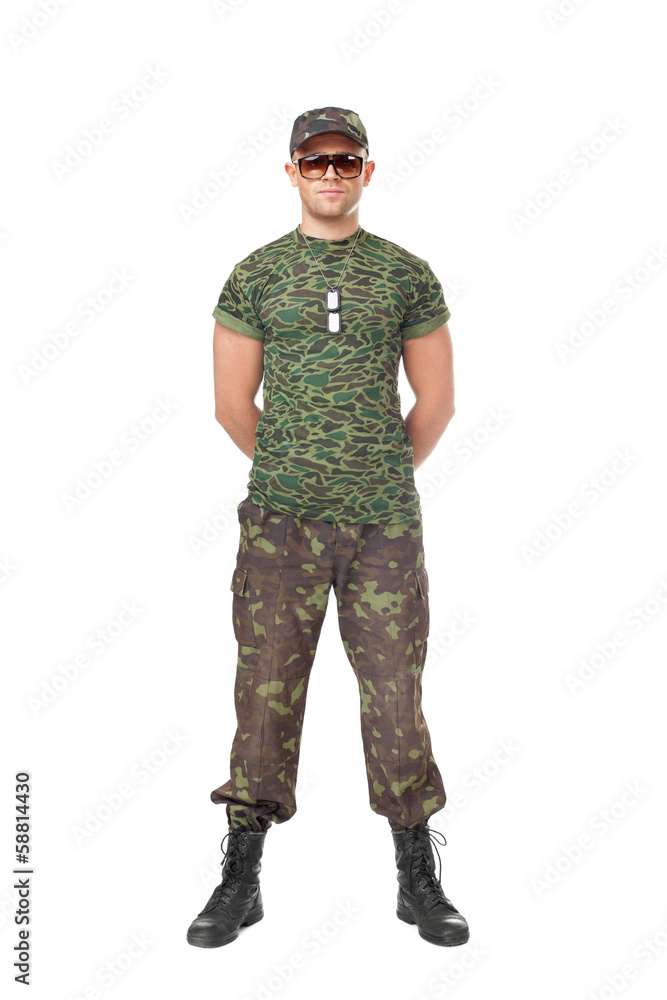 Army soldier standing in attention Army soldier standing in attention