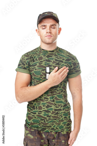 фотографія Young army soldier swear solemnly