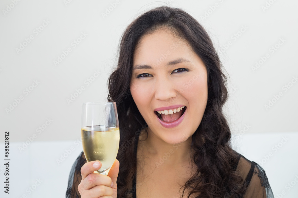 Portrait of a beautiful young woman with champagne Portrait of a beautiful young woman with champagne