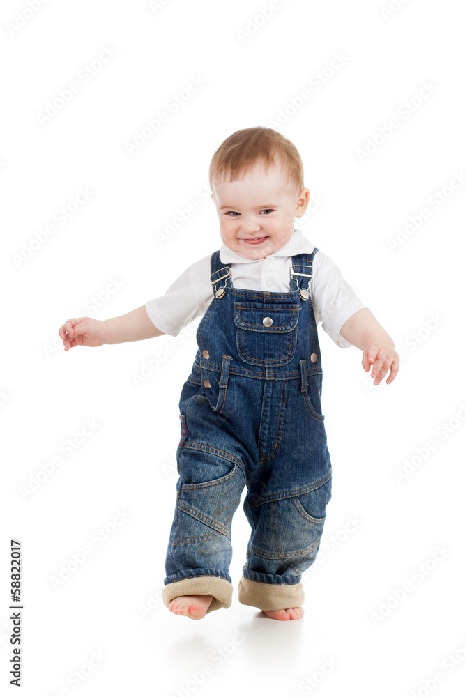 Funny baby boy is running. Studio shot. Funny baby boy is running. Studio shot.