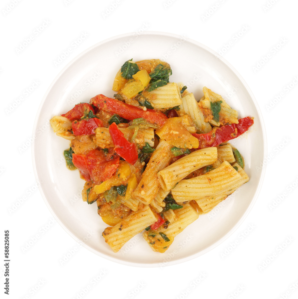 Rigatoni and vegetables on a small plate Rigatoni and vegetables on a small plate