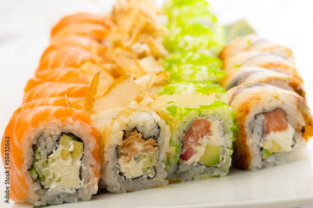 Sushi rolls on white plate Sushi rolls on white plate