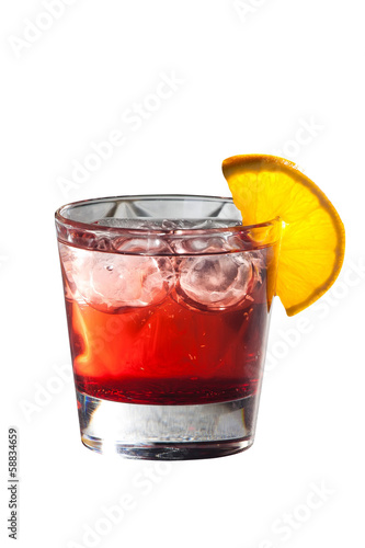 Cocktail with grenadine juice and lemon isolated on white
