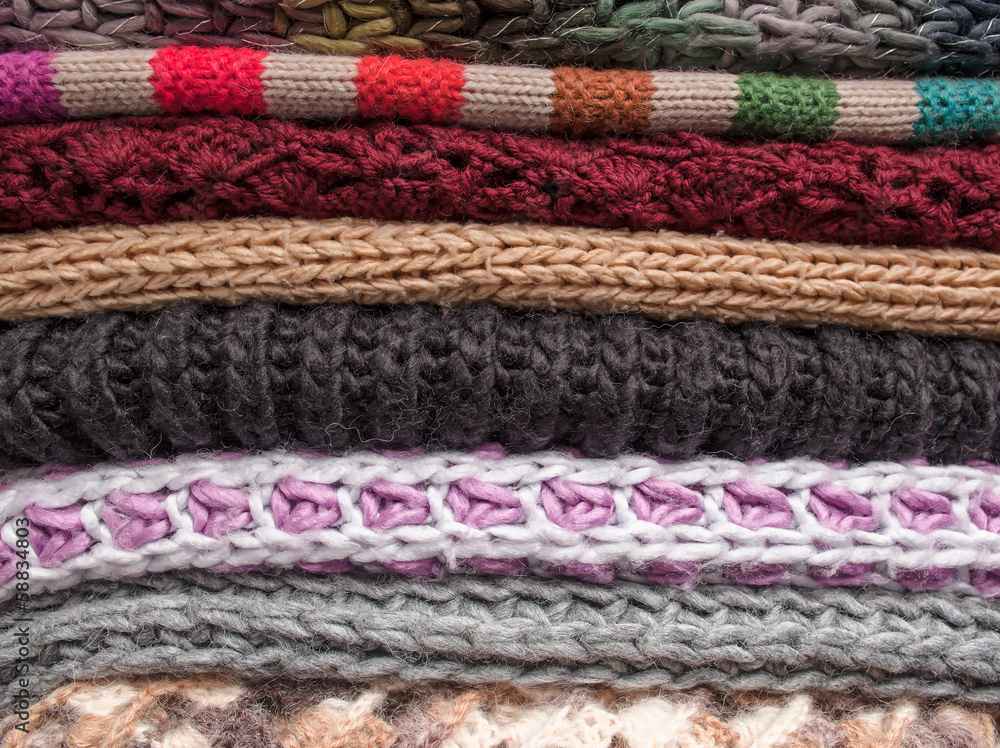 stack of knitted woolen clothes stack of knitted woolen clothes
