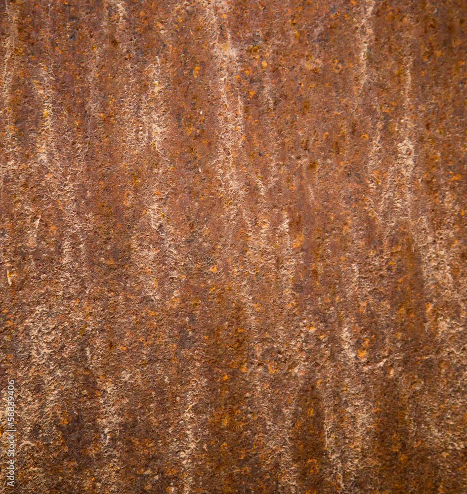 Naklejka premium old rusty iron as a backdrop. texture