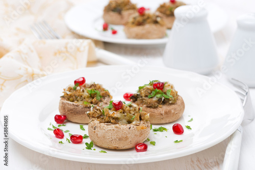 appetizer - stuffed mushrooms with herbs and pomegranate