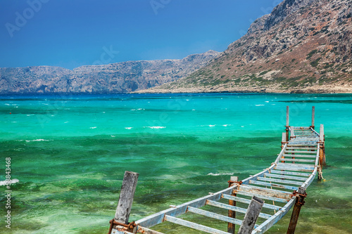 Fototapeta Naklejka Na Ścianę i Meble -  Old fishing bridge. Balos bay, Crete, Greece.