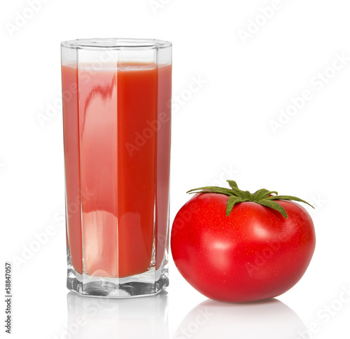 Glass of juice and the tomato