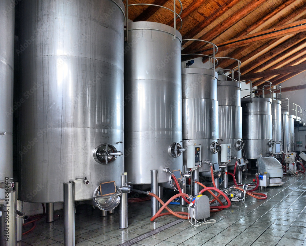 Stainless steel wine vats in a row Stainless steel wine vats in a row