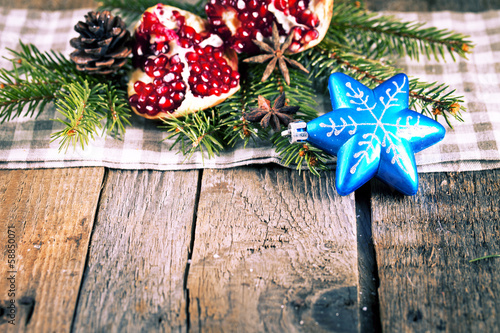 Pomegranate fruit on wooden background