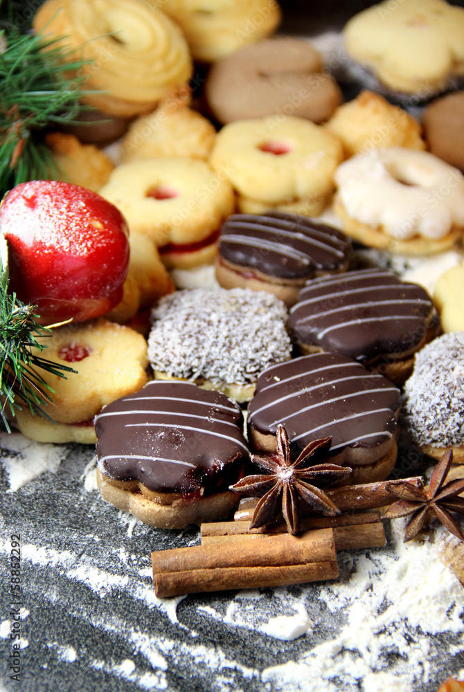 Mix of Christmas cookies with cinnamon on the table Mix of Christmas cookies with cinnamon on the table