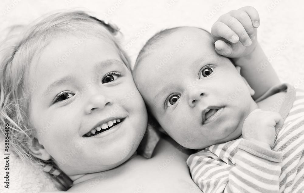 happy sister hugging baby brother happy sister hugging baby brother