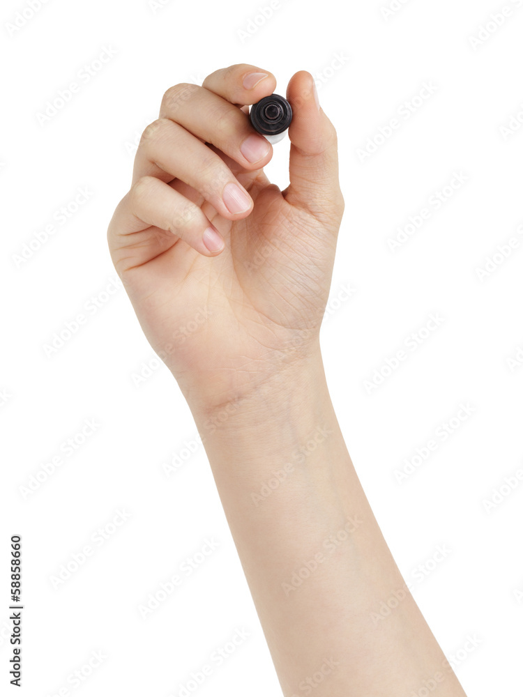 female teen hand to write sommething with black marker female teen hand to write sommething with black marker