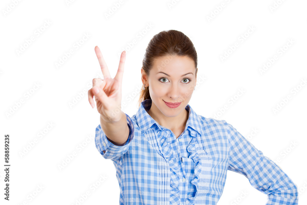 Excited young business woman giving victory sign Excited young business woman giving victory sign
