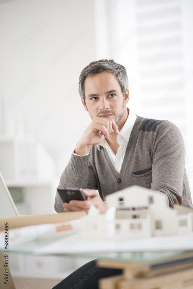 Fototapeta premium architect working at his laptop on the office