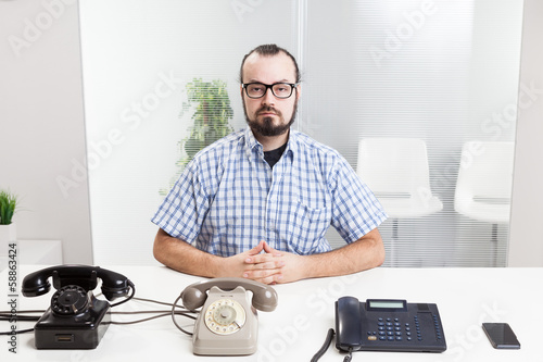 Fotografia Very busy man working on call center