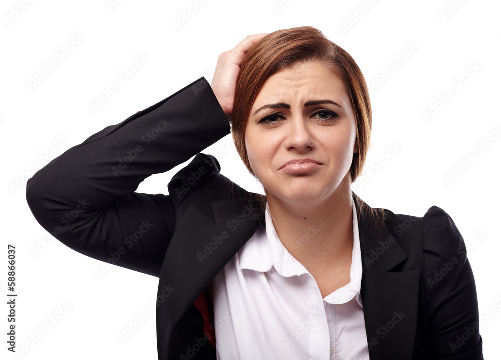 Unhappy businesswoman with hands on head Unhappy businesswoman with hands on head