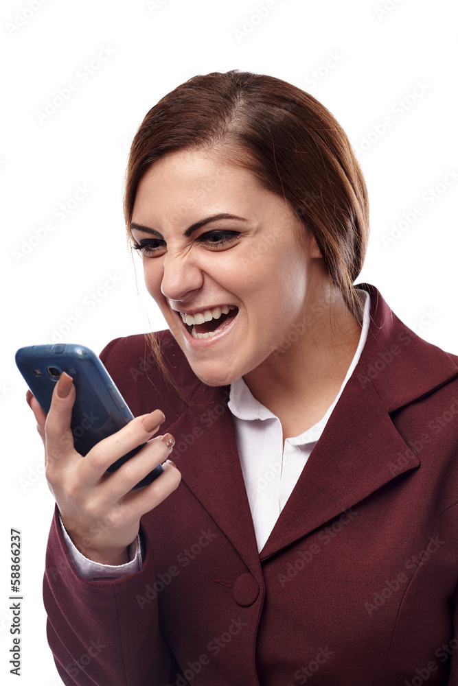 Angry businesswoman screaming into the cell phone Angry businesswoman screaming into the cell phone