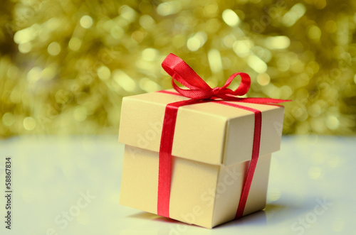 Wallpaper Mural Gift boxes with red ribbon on abstract holiday background Torontodigital.ca