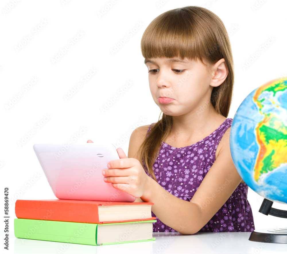 Young girl is using tablet Young girl is using tablet