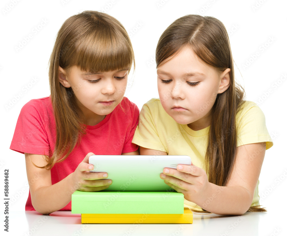 Children are using tablet