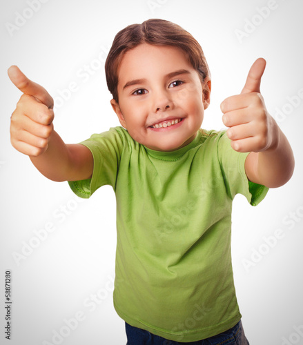 baby girl emotions raised her thumbs up smiling symbol indicates