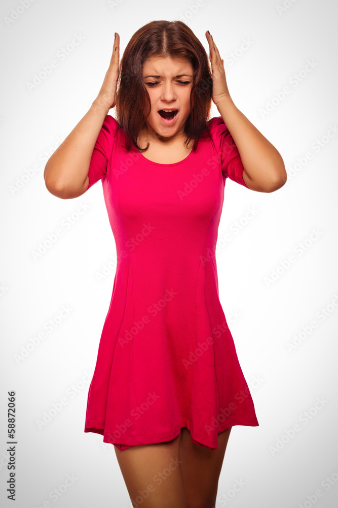 brunette woman covering her ears with hands screaming opened brunette woman covering her ears with hands screaming opened
