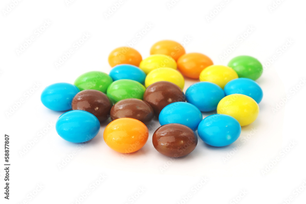 colorful chocolate candies on white background colorful chocolate candies on white background