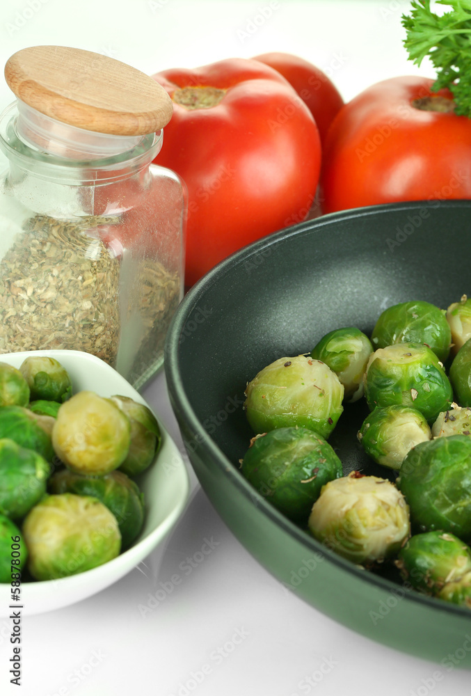 Fresh brussels sprouts in pan with vegetables and spices Fresh brussels sprouts in pan with vegetables and spices
