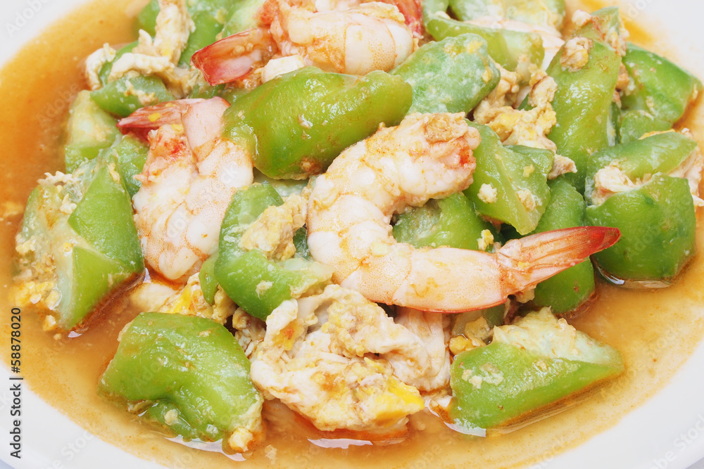 stir fried gourd with shrimp and egg on plate stir fried gourd with shrimp and egg on plate
