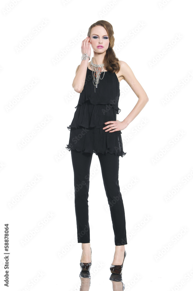 beautiful young female standing in black dress posing beautiful young female standing in black dress posing