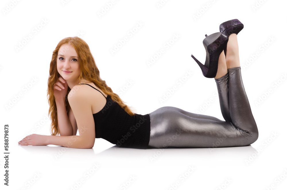 Young redhead girl in tight leggings Stock Photo | Adobe Stock