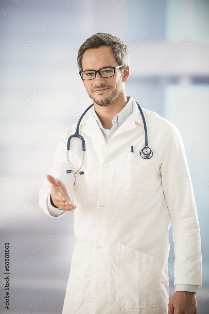 doctor holding out his hand as a sign of hospitality doctor holding out his hand as a sign of hospitality