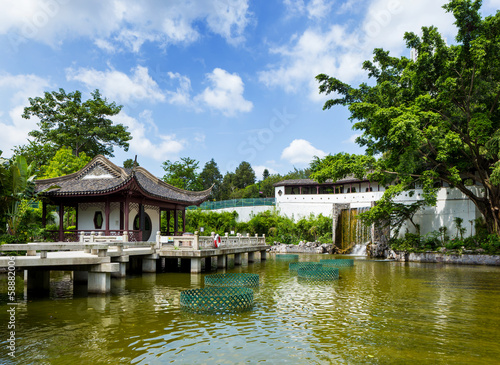 Traditional chinese pavilion with pond