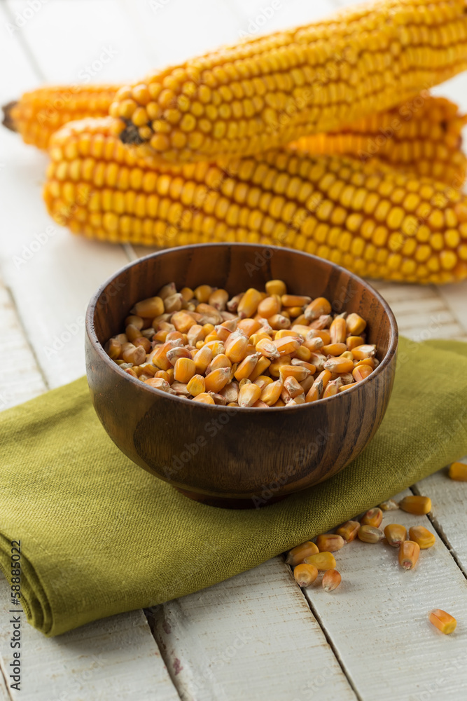 Fresh corn on wooden background Fresh corn on wooden background