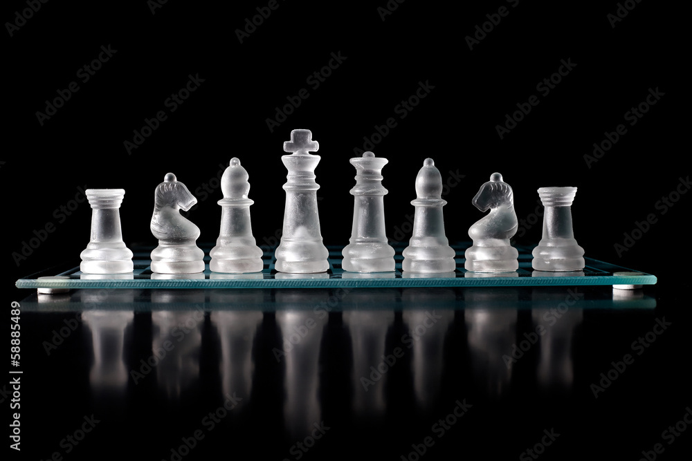 glass chess board with chess pieces glass chess board with chess pieces