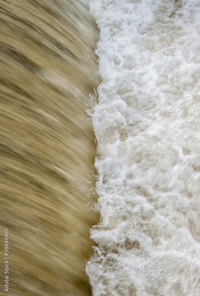 foaming water at a weir