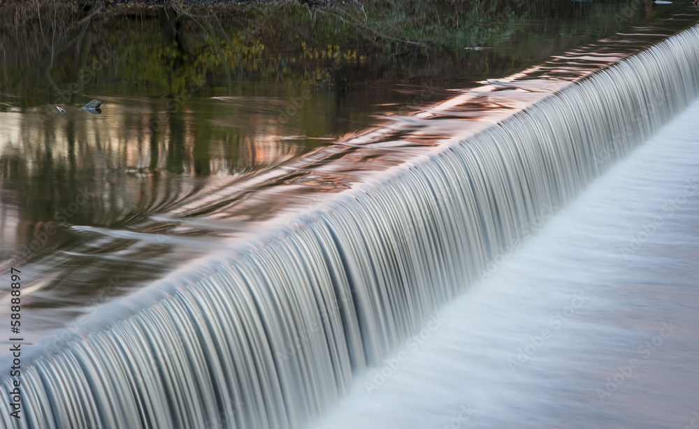 Fototapeta premium motion blurred river weir