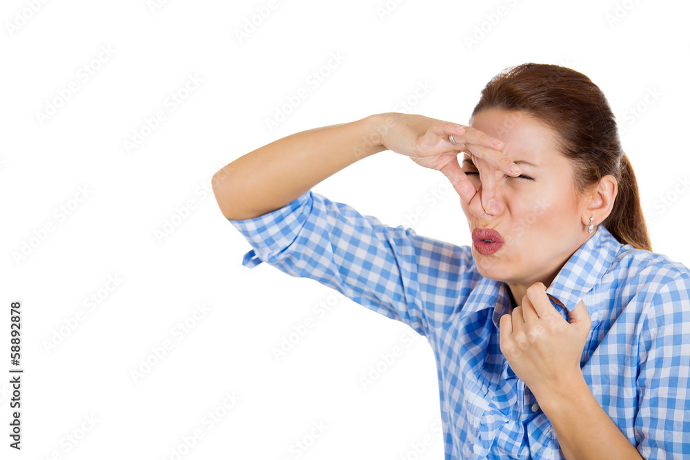 Woman covers her nose, can't breath, something stinks Woman covers her nose, can't breath, something stinks