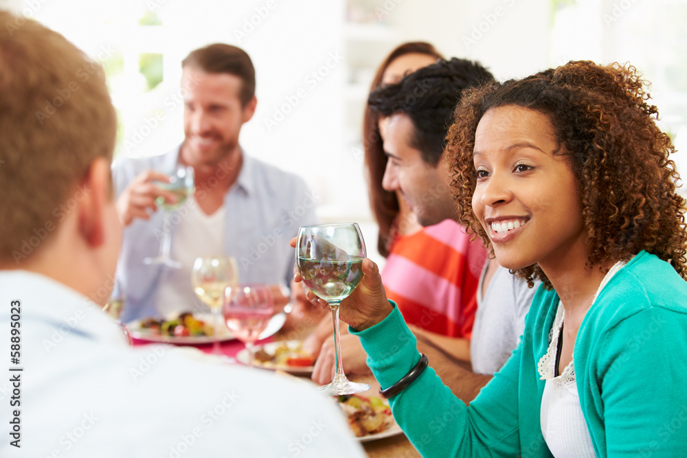 Group Of Friends Sitting Around Table Having Dinner Party Group Of Friends Sitting Around Table Having Dinner Party