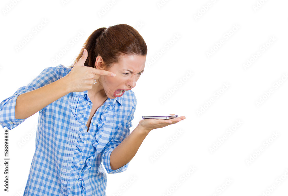 Fototapeta premium Angry, upset, screaming woman on a cell phone