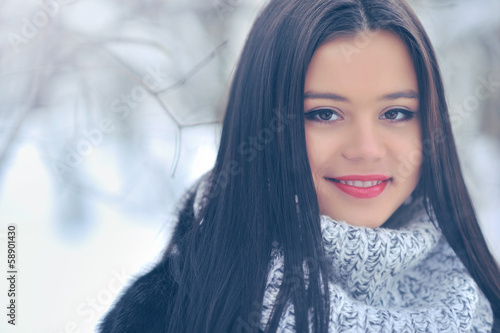 Beauty girl on the winter background