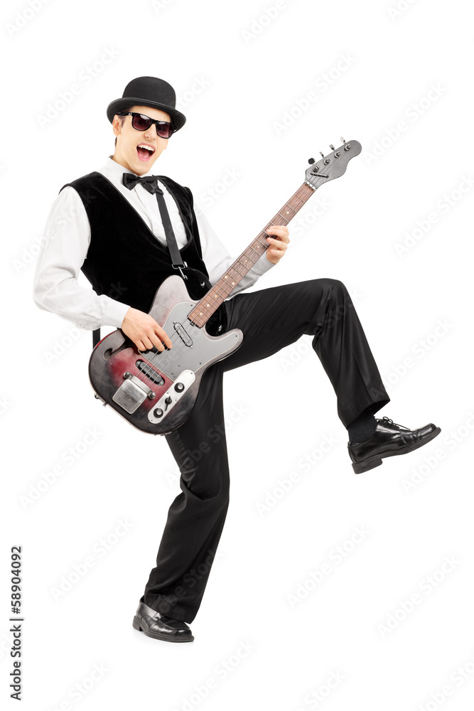 Euphoric man playing a bass guitar Euphoric man playing a bass guitar