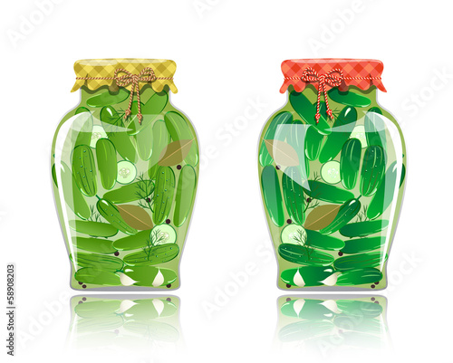 Glass jar of preserved cucumbers and spices