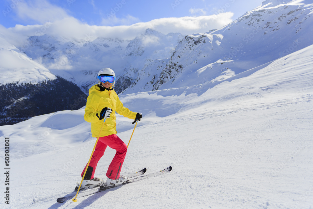 Ski, skier, sun  - woman enjoying ski vacation