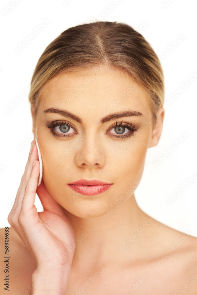 Closeup portrait of young beautiful blonde girl