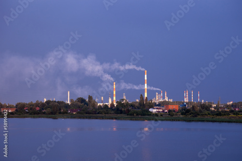 Heavy storm clouds over the refinery. Gdansk, Poland.