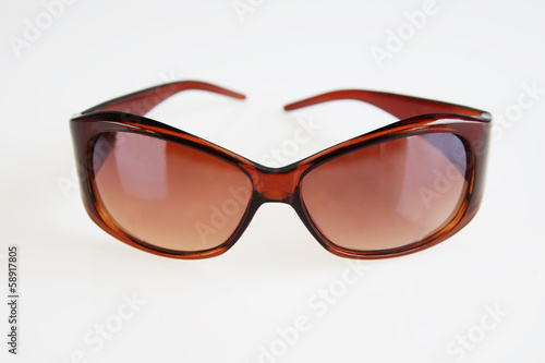 Sunglasses over light background